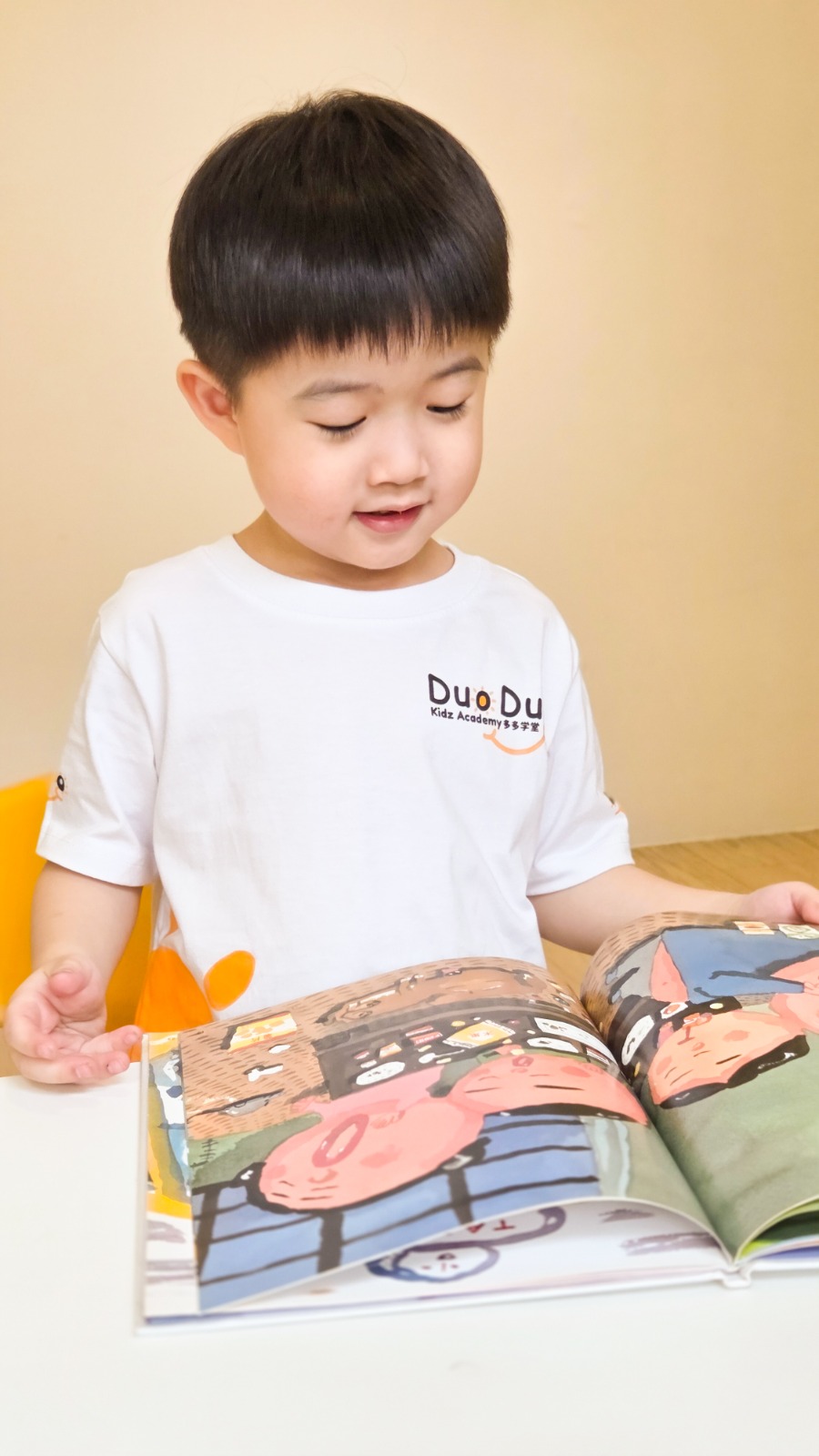 Child smiling proudly